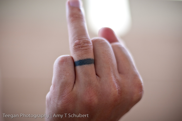 and my wedding band tattooed on my ring finger.